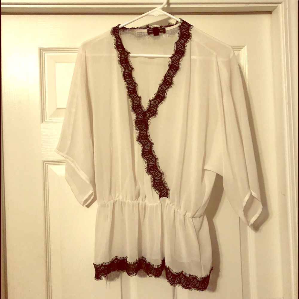 Willi Smith white and black blouse.